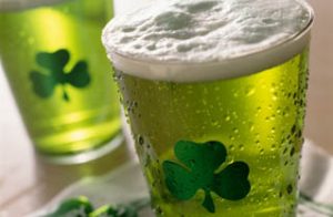 Close up of beverages with shamrocks on glass