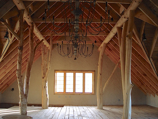Private Artist Studio Rustic private artist studio - semi-raw alder tree supports, exposed wood trusses.