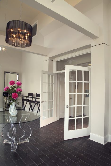 AmazingCosmetics French doors open from the make-up studio to the office space at AmazingCosmetics.
