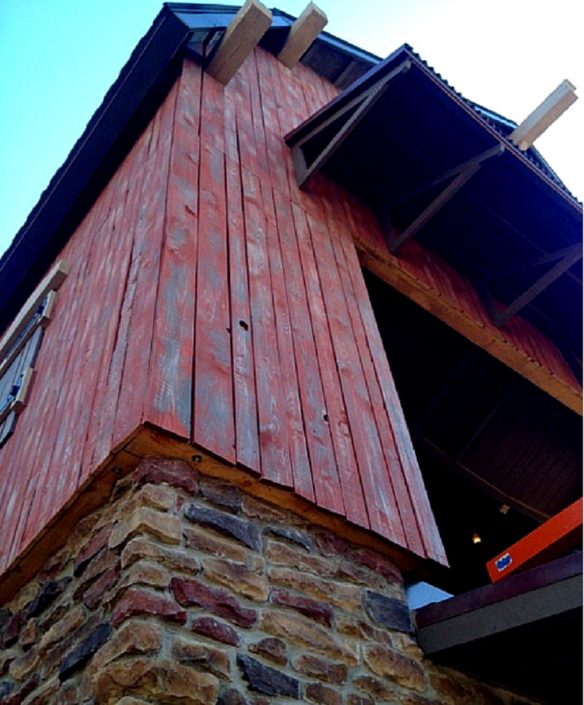 Holiday World Splashin’ Safari – Thunderbird Roller Coaster This image is a close up of the materials used to build the launch station, including stonework and hand-weathered barn wood.