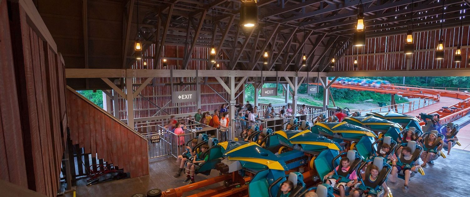 Holiday World Splashin' Safari - Thunderbird Roller Coaster In this image riders are loading onto the winged-coaster in the launch station.