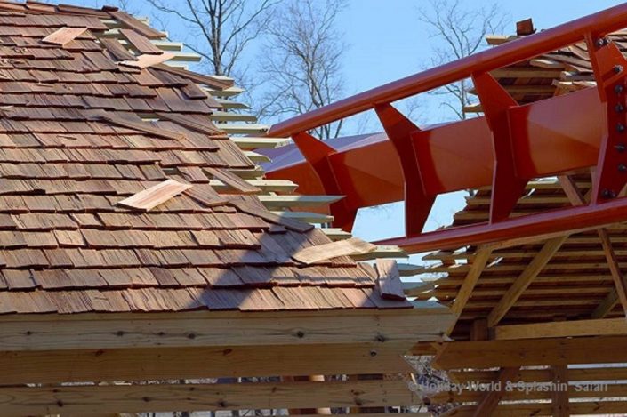 Holiday World Splashin’ Safari – Thunderbird Roller Coaster This image is a close of the near miss element showing the coaster track breaking through the barn.
