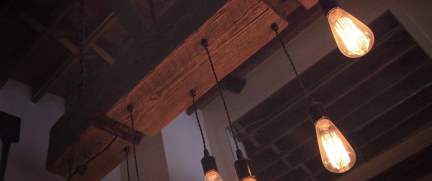 Pizzeria DeVille custom made rustic light fixture.