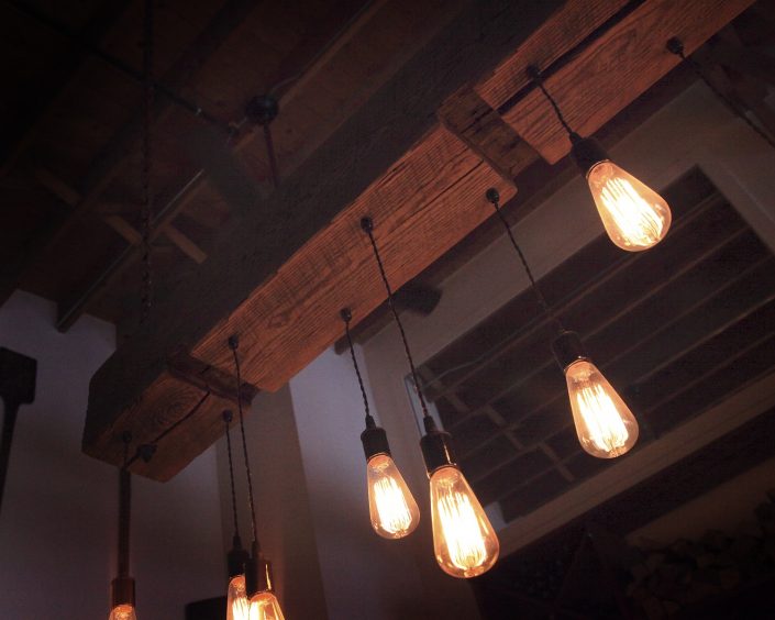 Pizzeria DeVille custom made rustic light fixture.