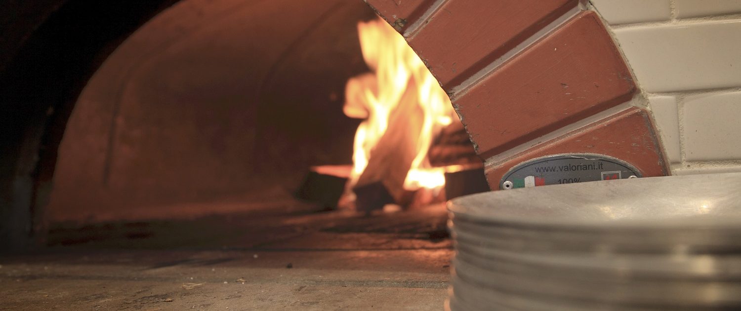 Pizzeria DeVille wood buring pizza oven.