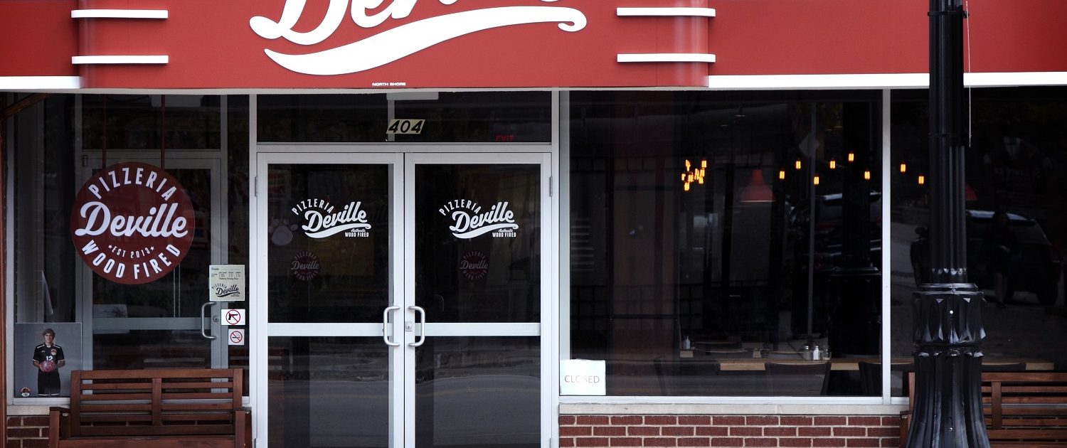 View of the front entrance to Pizzeria DeVille in downtown Libertyville.