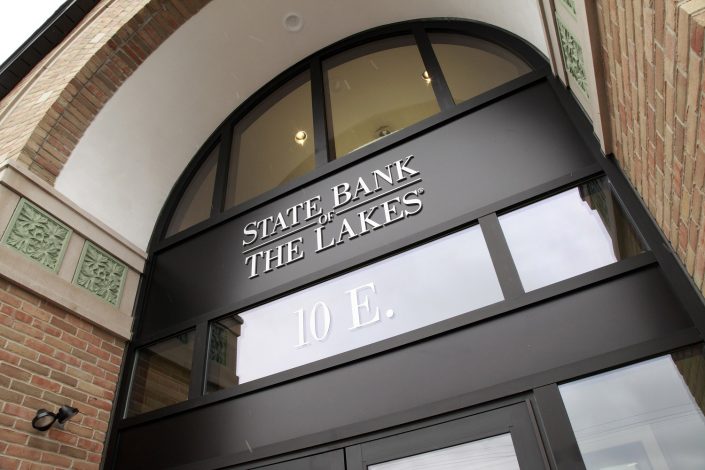 Two-story entrance of State Bank of The Lakes in Round Lake, IL.