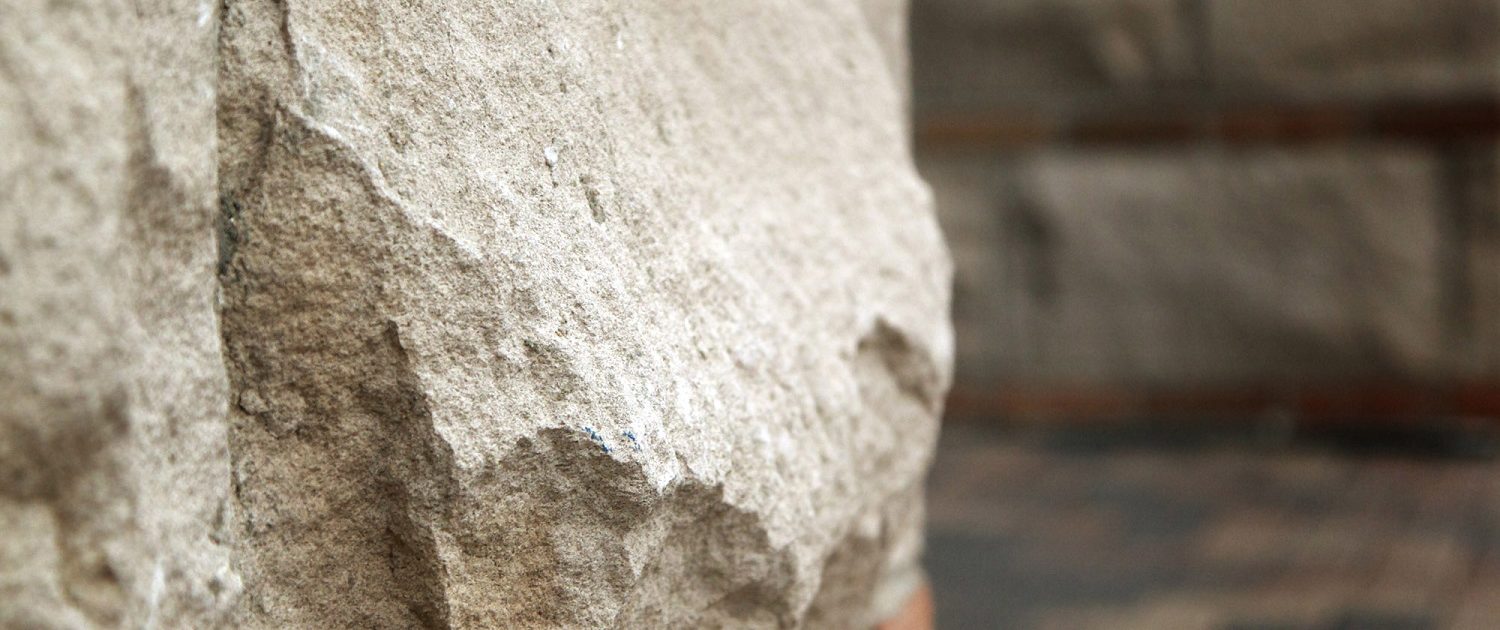 Detail photo of the brick and stone work at State Bank of The Lakes.