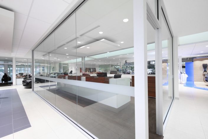 View of the managers offices from the showroom floor at Knauz Motors.