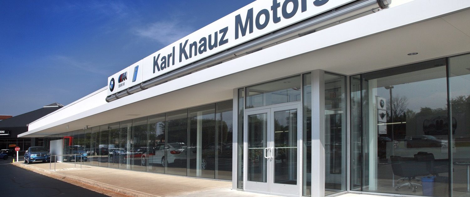 The dominant use of the brand color white reinforces the sophistication of the BMW brand on Knauz Motors new modern exterior facade.