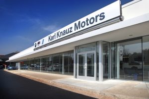 The dominant use of the brand color white reinforces the sophistication of the BMW brand on Knauz Motors new modern exterior facade.