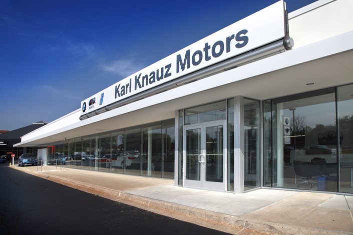 The dominant use of the brand color white reinforces the sophistication of the BMW brand on Knauz Motors new modern exterior facade.