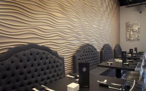 Shakou St. Charles plaster-skinned wave wall design element in the first floor dining room.