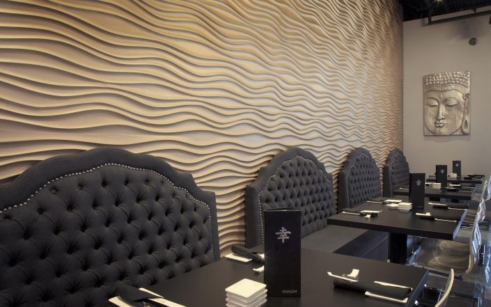 Shakou St. Charles plaster-skinned wave wall design element in the first floor dining room.