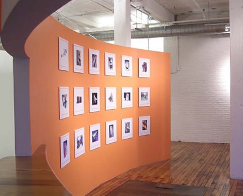 Bleck Design Group - hi-tech elements included fabric duct work, high efficiency indirect lighting, and a modern product display gallery.