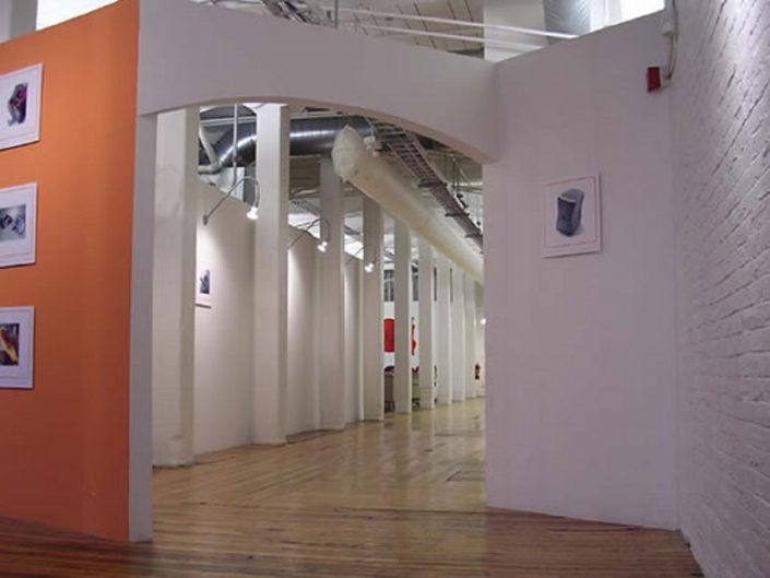 Bleck Design Group Bleck Design Group. We played up the loft nature of the building shell, restoring hickory factory floors and utilized office furniture fashioned from reclaimed wood.