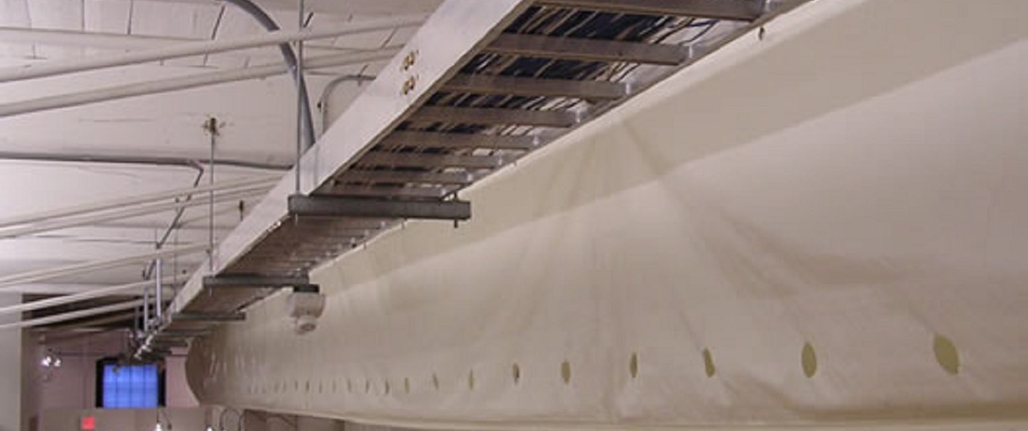 Bleck Design Group Bleck Design Group hi-tech elements included fabric duct work, high efficiency indirect lighting, and a modern product display gallery