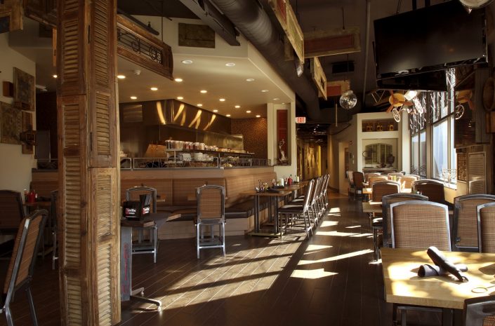 View of the open kitchen and dining area at Chili U.