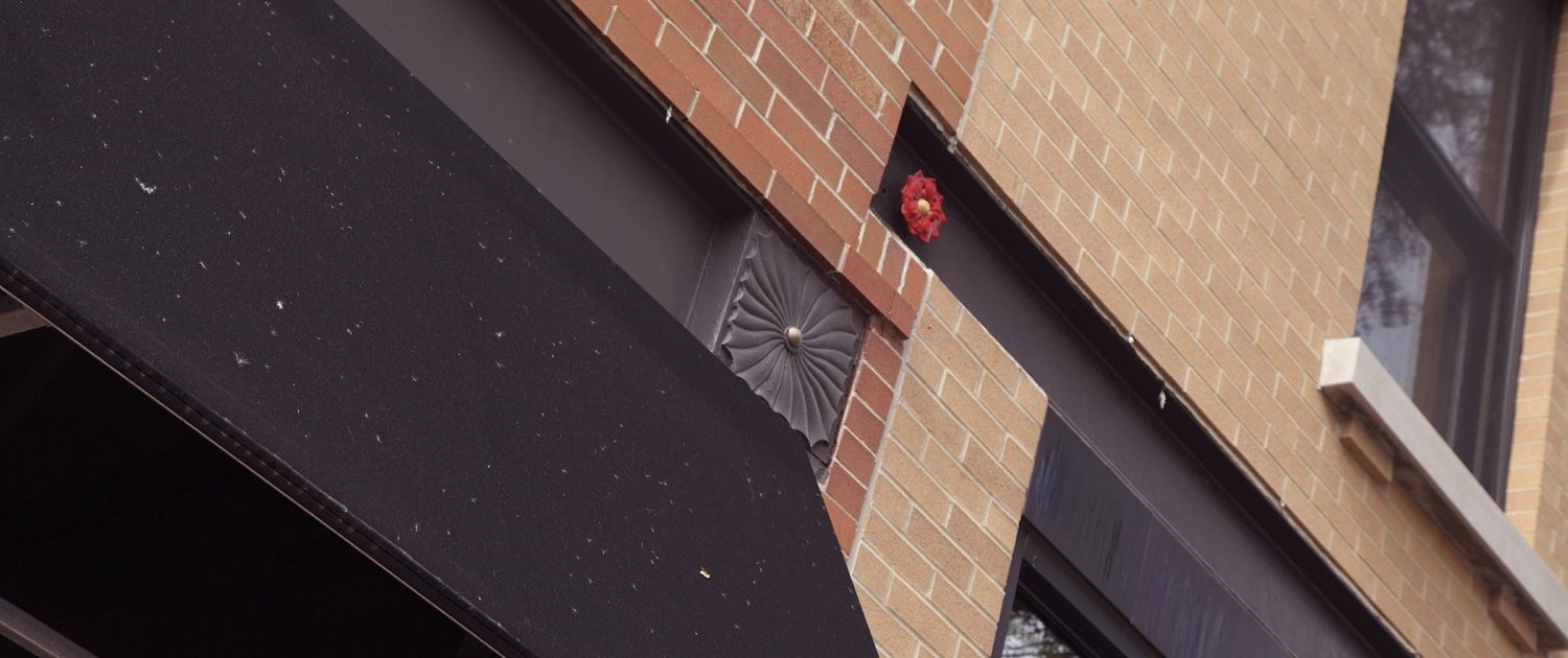 View of Chili U's exterior facade with custom details.