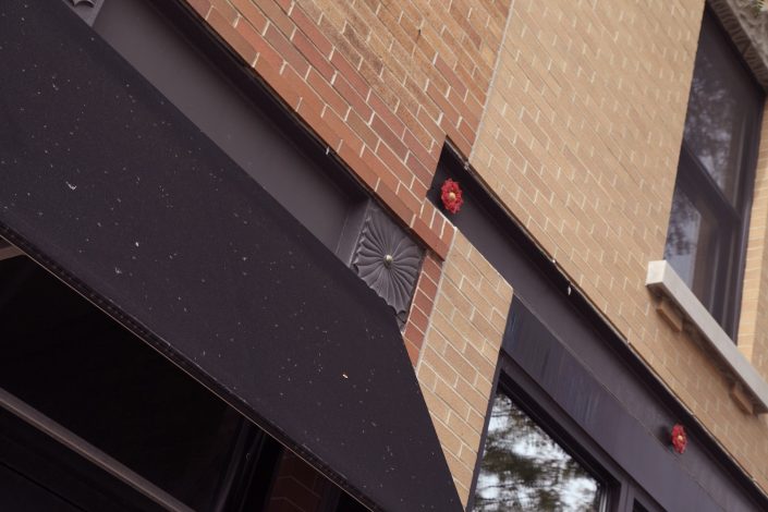 View of Chili U's exterior facade with custom details.