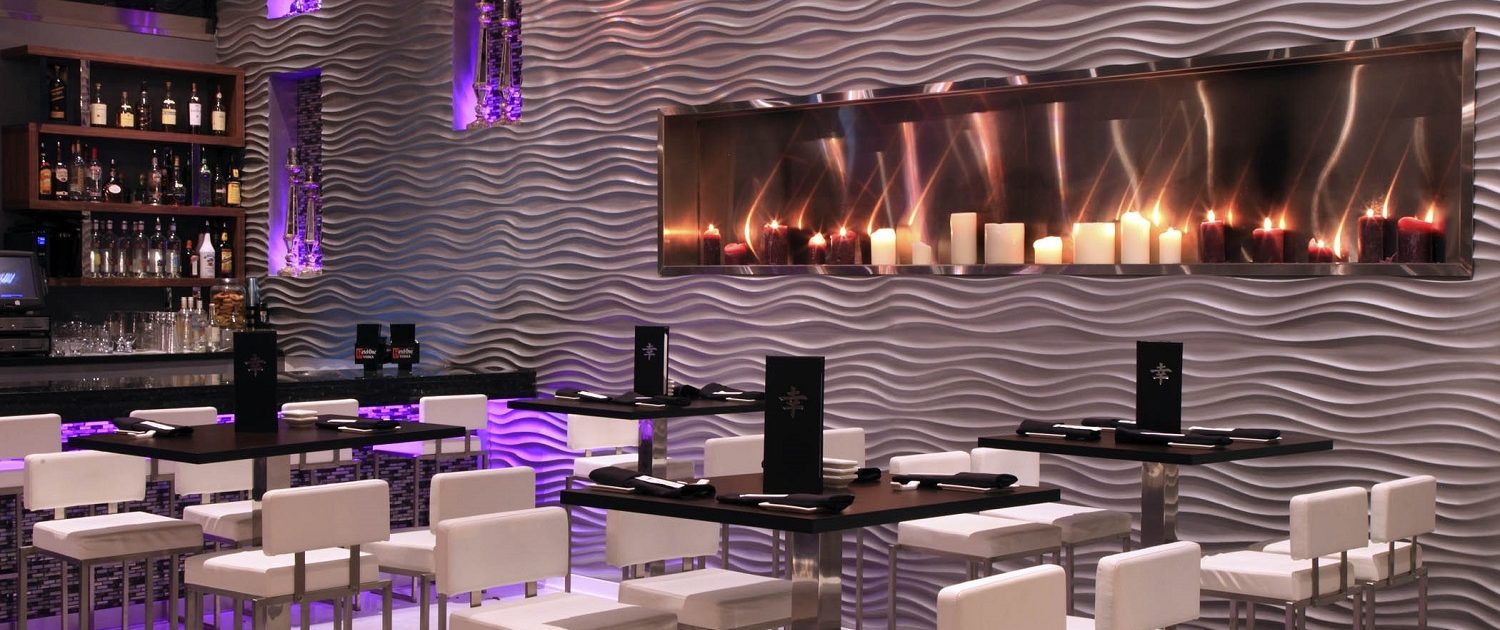 Shakou - Libertyville 12-foot wide horizontal stainless in-wall fireplace at Shakou Libertyville.