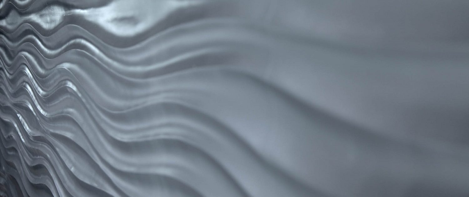 Shakou - Libertyville Plaster-skinned wave wall design element located in the first level bar.