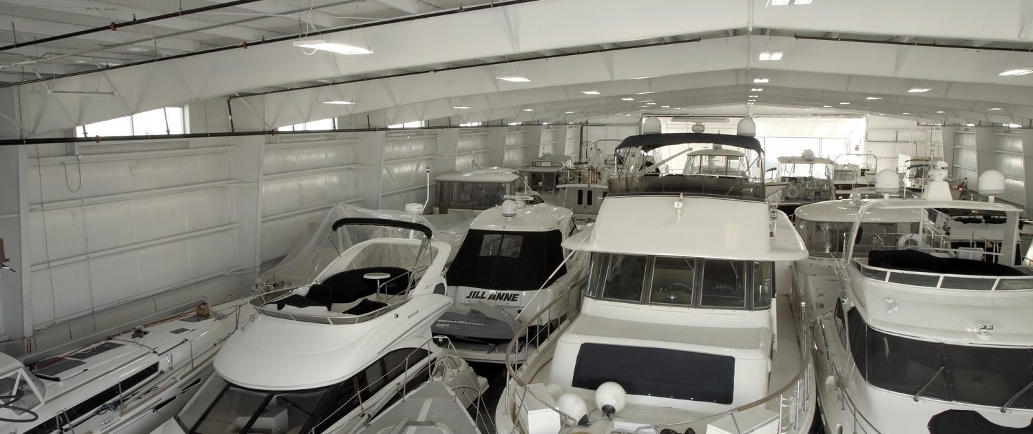 Larsen Marine - Boat Warehouse, interior view filled with boats.