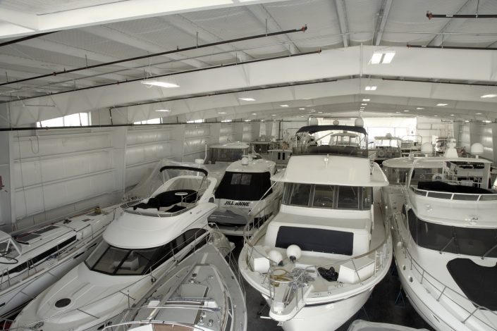 Larsen Marine - Boat Warehouse, interior view filled with boats.
