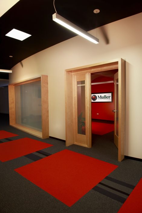 Muller Trading Company Inc The glass walled conference room can become completely private with a flick of the switch through the use of electric privacy glass.