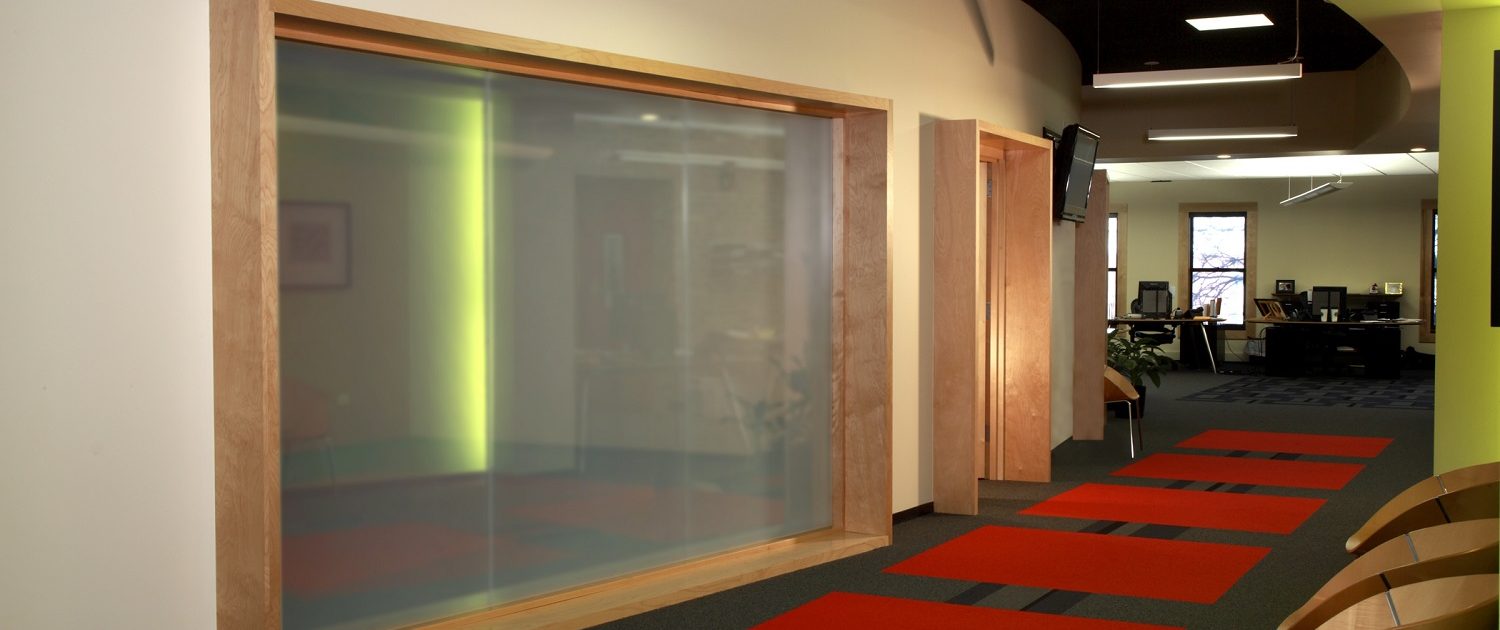 Muller Trading Company Inc The glass walled conference room can become completely private with a flick of the switch through the use of electric privacy glass.