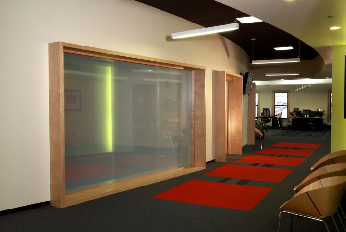 Muller Trading Company Inc The glass walled conference room can become completely private with a flick of the switch through the use of electric privacy glass.