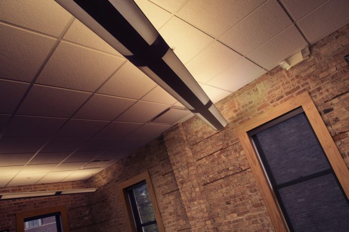 Muller Trading Company Inc Preserved and restored brick interior walls at Muller Trading Company.