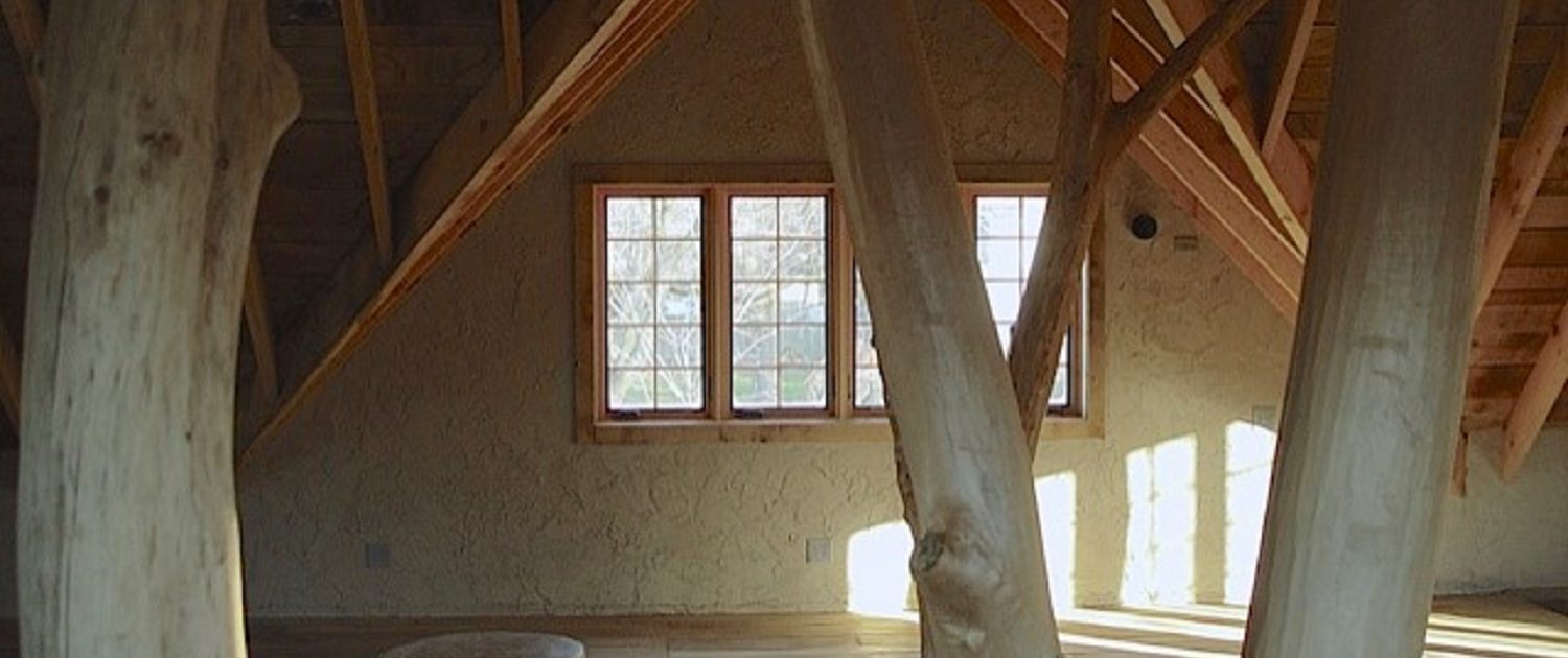 Private Artist Studio Private Artist Studio - The building structure is an artistic expression of a forest, with semi-raw alder trees rising from the lower level 3-car garage to the upper level studio.