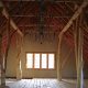 Private Artist Studio - The building structure is an artistic expression of a forest, with semi-raw alder trees rising from the lower level 3-car garage to the upper level studio.