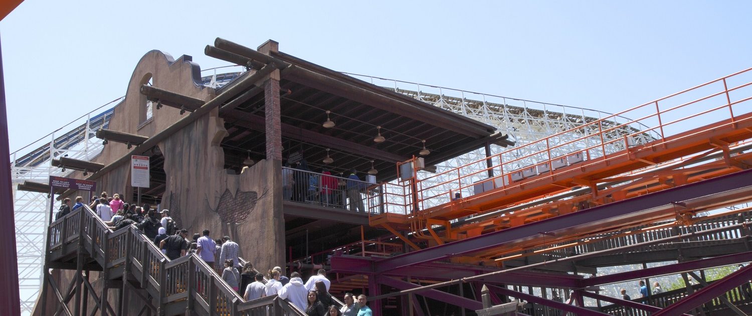 Six Flags Great America - Raging Bull designed to look like a ruined southwestern mission with a structure of tall log poles and a platform of steel and concrete.