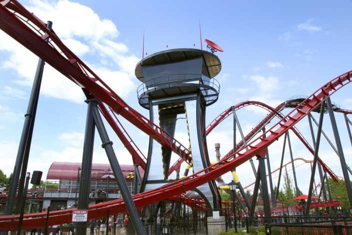 X Flight – Six Flags Great America View of X Flight's control tower and loading station in the background.