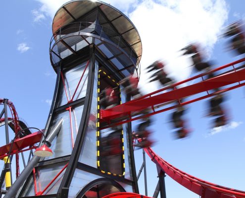 The adrenaline-pumping thrill element as the X Flight train speeds through the Control Tower.