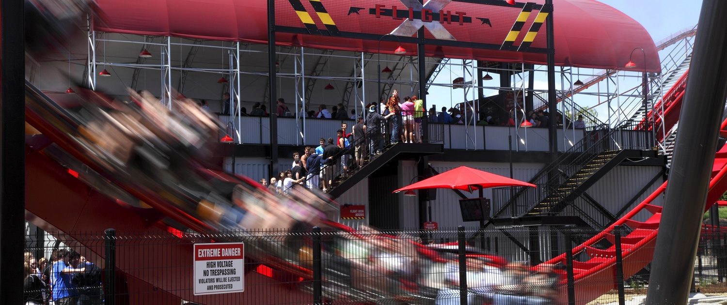 X Flight - Six Flags Great America View of the loading station from the queueing line.