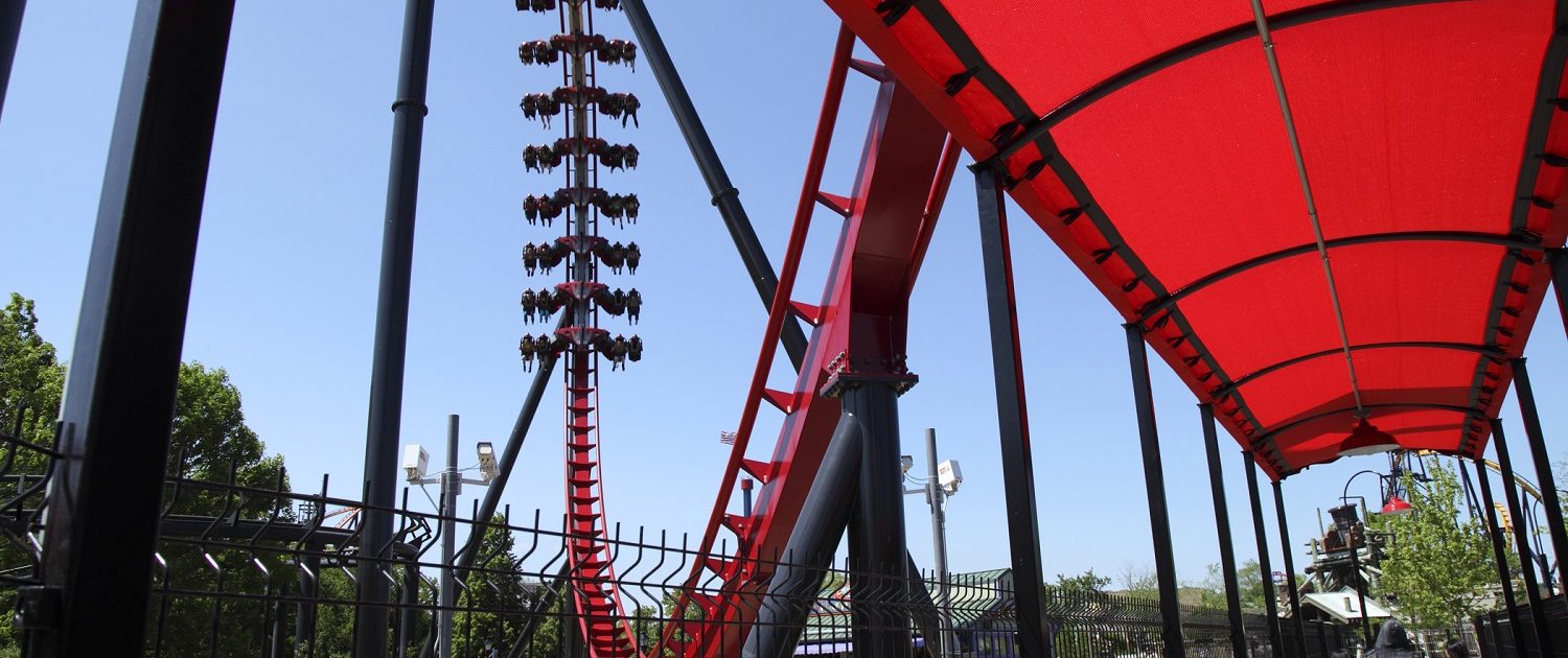 X Flight - Six Flags Great America Park guest get an up close view of X Flight as it come out of the high speed dive drop.